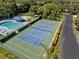 Community pool, tennis court, and recreation areas at 390 301 W Blvd # 5C, Bradenton, FL 34205