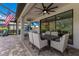 Outdoor dining area on a brick paved patio at 16215 Tradewind Ter, Lakewood Ranch, FL 34211