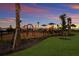 playground with swings and play structures at 16215 Tradewind Ter, Lakewood Ranch, FL 34211