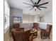 Multi-functional bonus room with comfortable seating and a ceiling fan at 16215 Tradewind Ter, Lakewood Ranch, FL 34211