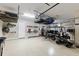 Garage with overhead storage and golf cart at 16215 Tradewind Ter, Lakewood Ranch, FL 34211