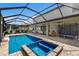 Pool and spa with covered patio and a basketball hoop at 16215 Tradewind Ter, Lakewood Ranch, FL 34211