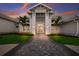 Entrance to the community clubhouse with a paved walkway at 16215 Tradewind Ter, Lakewood Ranch, FL 34211
