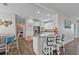 Kitchen with breakfast bar and view into dining area at 7301 221St E St, Bradenton, FL 34211