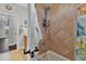 Bathroom with shower/tub combo and tiled walls at 7301 221St E St, Bradenton, FL 34211