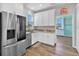 Kitchen boasts stainless steel appliances and granite countertops at 7301 221St E St, Bradenton, FL 34211