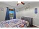 Bedroom featuring a dresser and nautical-themed bedding at 7301 221St E St, Bradenton, FL 34211