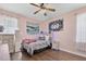 Bedroom with a full bed, dresser and wood floors at 7301 221St E St, Bradenton, FL 34211