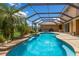 Resort-style pool with a spa and expansive screened enclosure at 7301 221St E St, Bradenton, FL 34211