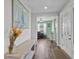 Bright entryway with hardwood floors and office view at 7301 221St E St, Bradenton, FL 34211