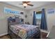 Bedroom with a nautical-themed bedspread and dresser at 7301 221St E St, Bradenton, FL 34211