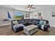 Spacious living room with sectional sofa and large windows at 7301 221St E St, Bradenton, FL 34211