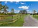 Long driveway leading to a house on a large lot at 7301 221St E St, Bradenton, FL 34211