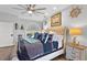 Nautically-themed bedroom with a large bed, dresser, and window at 7301 221St E St, Bradenton, FL 34211