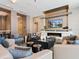 Spacious living room with fireplace and ample seating at 111 S Pineapple Ave # 605, Sarasota, FL 34236