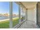 Spacious patio with sliding glass doors offering water views at 7420 Bay Island S Dr # 171, South Pasadena, FL 33707