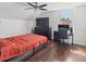 Bedroom includes desk and dresser and is brightly lit with a large window at 7209 49Th E Pl, Palmetto, FL 34221