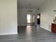 Bright dining room with vinyl plank flooring and sliding doors at 7861 Pine Trace Dr # 7861, Sarasota, FL 34243