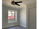 Bedroom with window seat and ceiling fan at 7861 Pine Trace Dr # 7861, Sarasota, FL 34243