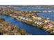 Luxury waterfront home with private dock and beautiful landscaping at 8030 Midnight Pass Rd, Sarasota, FL 34242