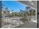 Private balcony overlooking the street and neighborhood at 8030 Midnight Pass Rd, Sarasota, FL 34242