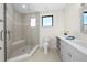 Modern bathroom featuring a glass shower and vanity at 8030 Midnight Pass Rd, Sarasota, FL 34242
