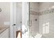 Clean bathroom with glass shower and modern fixtures at 8030 Midnight Pass Rd, Sarasota, FL 34242