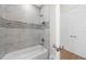 Elegant bathroom with marble shower and bathtub at 8030 Midnight Pass Rd, Sarasota, FL 34242