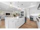 Modern kitchen with stainless steel appliances and white cabinetry at 8030 Midnight Pass Rd, Sarasota, FL 34242