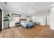 Spacious main bedroom with a king-size bed and sitting area at 8030 Midnight Pass Rd, Sarasota, FL 34242
