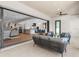Covered patio with comfortable seating and indoor views at 8030 Midnight Pass Rd, Sarasota, FL 34242