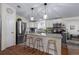 Modern kitchen with stainless steel appliances and island at 8454 Imperial Cir, Palmetto, FL 34221