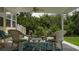 Covered patio with seating area, perfect for outdoor relaxation at 8454 Imperial Cir, Palmetto, FL 34221