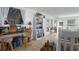 Sunroom with a workspace and built-in shelving, offering natural light at 8454 Imperial Cir, Palmetto, FL 34221