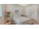 Cozy bedroom with double bed, artwork, and ample closet space at 1959 Hibiscus St, Sarasota, FL 34239