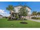 Two-story house with landscaping and palm trees at 3717 Savanna Palms Ct, Lakewood Ranch, FL 34211