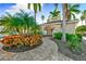 Community pool area with access gate and lush landscaping at 4030 Deberry Dr, Sarasota, FL 34233