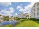 Community boasts waterfront property with multiple buildings and lush greenery at 3412 79Th Street W Cir # 202, Bradenton, FL 34209