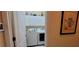 Convenient laundry room with washer, dryer, and overhead cabinets at 4808 Charles Partin Dr, Parrish, FL 34219