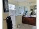 Elegant bathroom with double vanity, walk-in shower, and tiled flooring at 4808 Charles Partin Dr, Parrish, FL 34219
