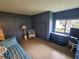 Bedroom with daybed, dresser and built-in storage at 5317 Chateau Ln, Bradenton, FL 34207