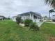 Single-wide manufactured home side view at 5317 Chateau Ln, Bradenton, FL 34207