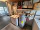 Unfinished laundry/storage area with water heater at 5317 Chateau Ln, Bradenton, FL 34207