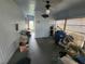 Enclosed porch with ample storage space at 5317 Chateau Ln, Bradenton, FL 34207
