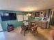 Bright dining area with glass table and wicker chairs at 5317 Chateau Ln, Bradenton, FL 34207
