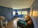 Bedroom with built-in storage and daybed at 5317 Chateau Ln, Bradenton, FL 34207
