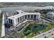 Expansive waterfront complex featuring a marina, lake, and lush landscaping, creating a picturesque setting at 5855 Midnight Pass Rd # 319, Sarasota, FL 34242