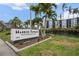 Harbor Towers Yacht & Racquet Club offers waterfront living with lush tropical landscaping and resort-style amenities at 5855 Midnight Pass Rd # 319, Sarasota, FL 34242
