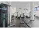 Well-equipped gym with various machines and weights for a complete fitness experience within the building at 5855 Midnight Pass Rd # 319, Sarasota, FL 34242