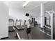 Well-equipped gym with modern fitness machines, free weights, and mirrors for a complete workout experience at 5855 Midnight Pass Rd # 319, Sarasota, FL 34242
